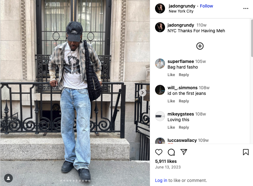 Person showcasing a 90s grunge look with layered, edgy clothing