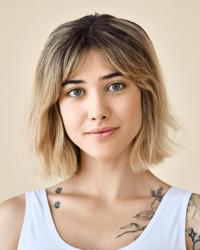 Side-swept bangs for square face shapes