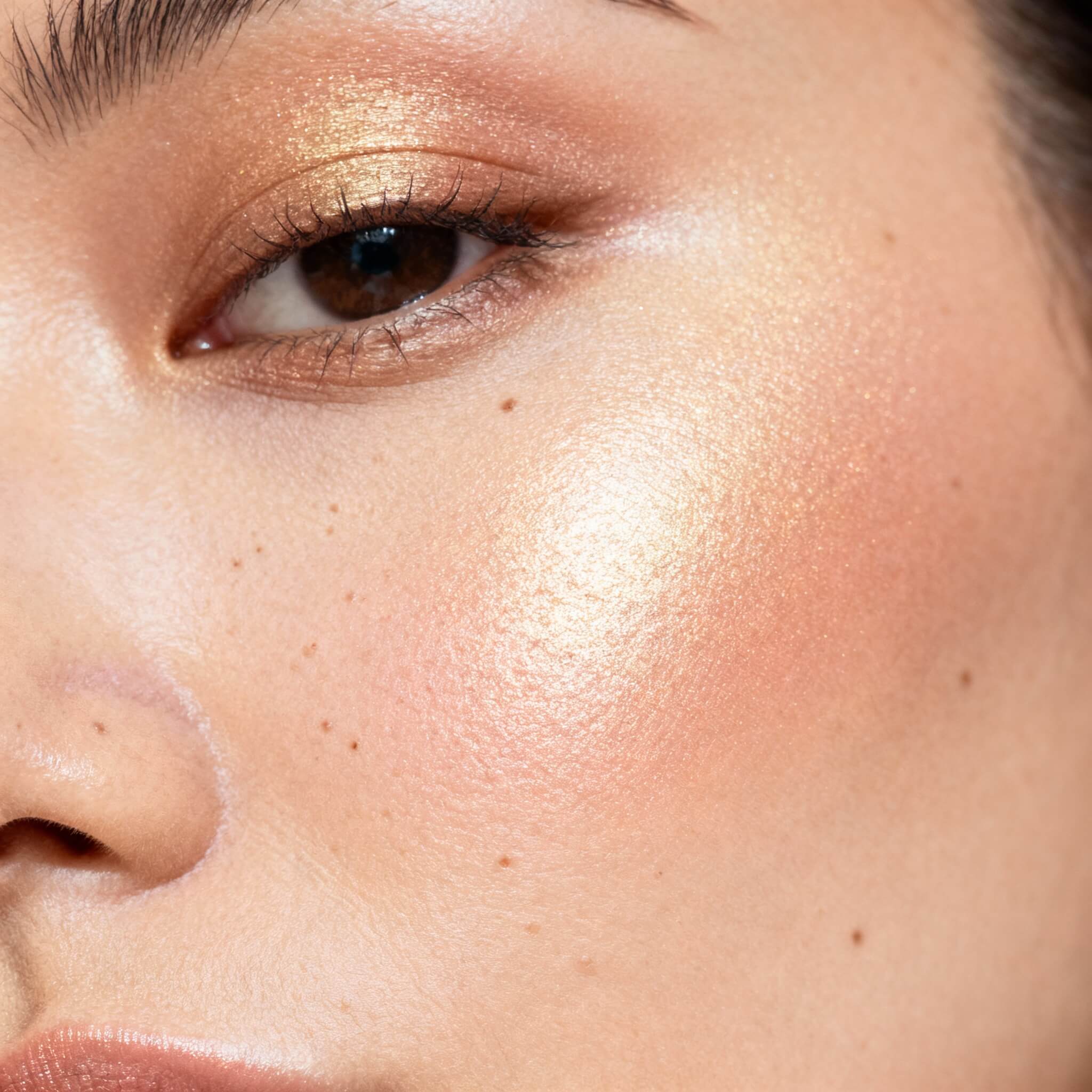 Cheekbone highlighting creates lift and glow. Cheekbone highlighting creates lift and glow.