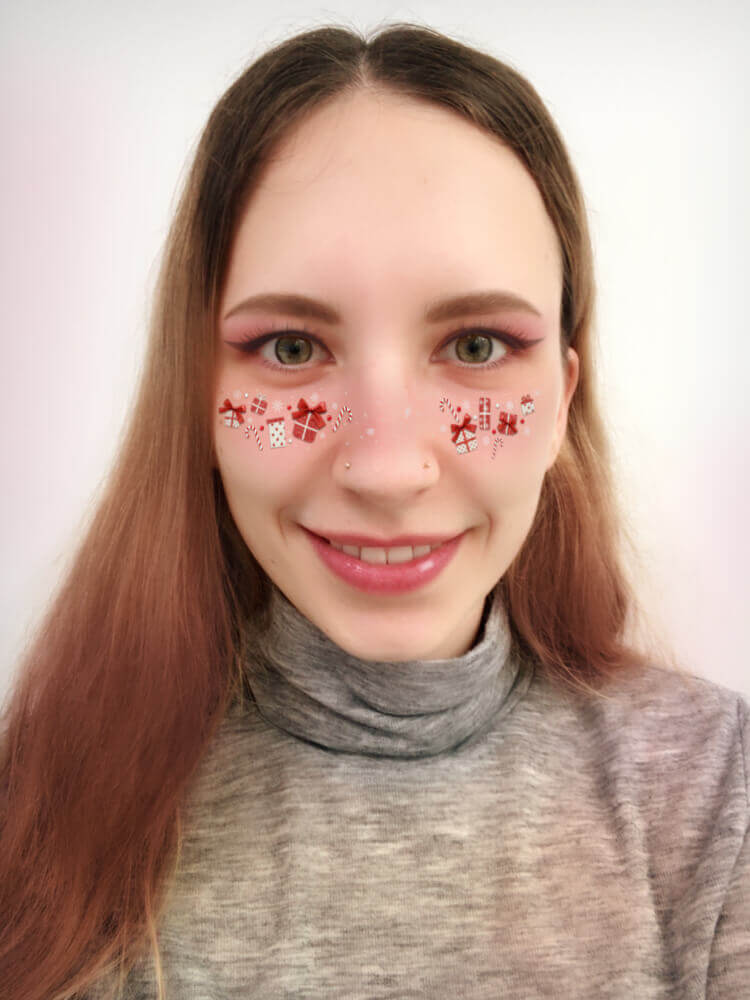 Zuckerstange Versüße dein Weihnachtsselfie mit dem Zuckerstangen-Filter.