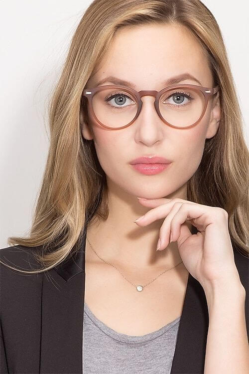 High Arched Eyebrows and Glasses