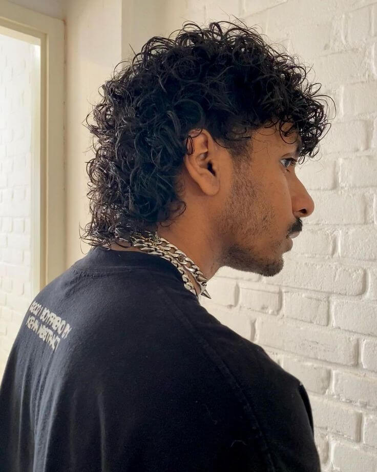Visualize yourself with curly mullet hairstyle using AI Agent tool. Upload reference image to AI Agent to see if curly hair for men suits you.
