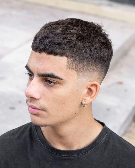 This curly hairstyle is clean, masculine, and easy to maintain. See if Curly Buzz Cut suits you with AI virtual try-on.
