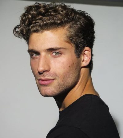 Visualize this latest hairstyle for men on yourself using YouCam Makeup app's AI tools.