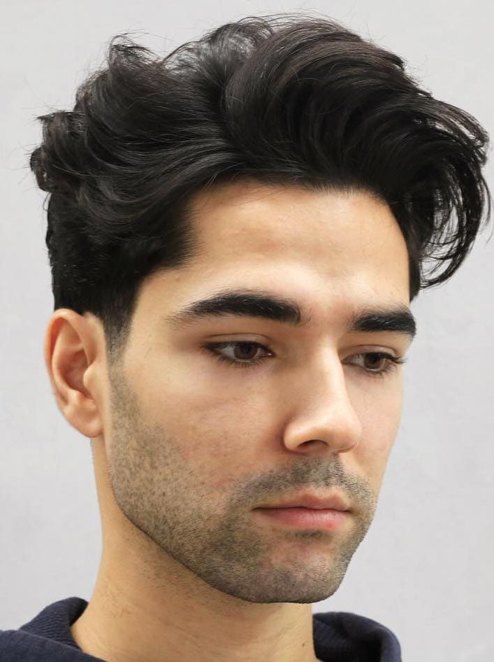 Layered quiff is one of the latest hairstyles for men in 2026.