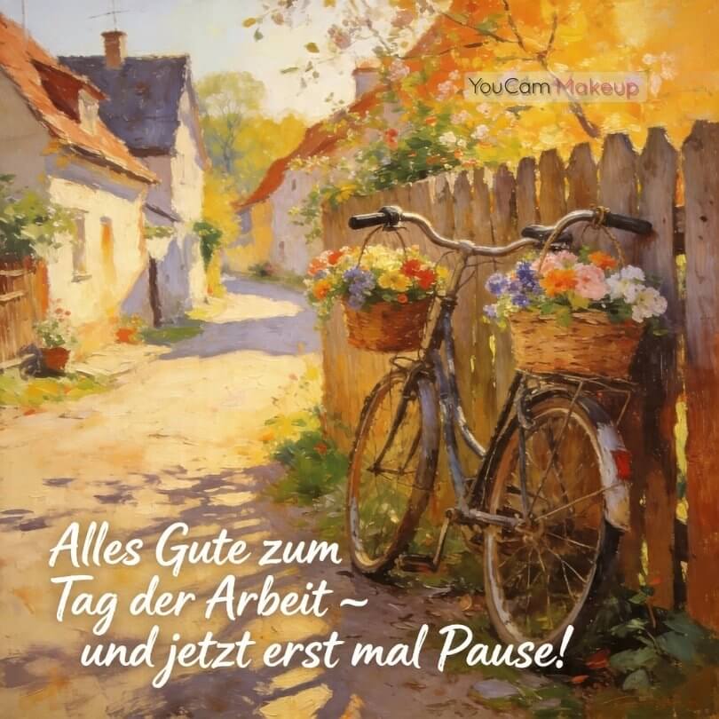 Alles Gute zum Tag der Arbeit – KI-generiertes Bild mit einem Fahrrad voller Frühlingsblumen an einem Zaun in einem idyllischen Dorf