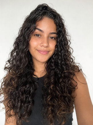 corte em camadas longas para cabelo cacheado feminino