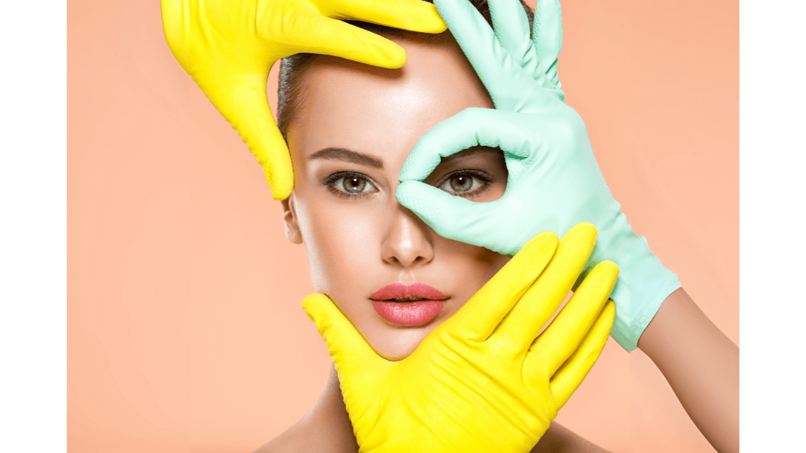 Golden Ratio and facial proportion analysis Colorful gloved hands framing a woman’s face in a conceptual facial aesthetics image.