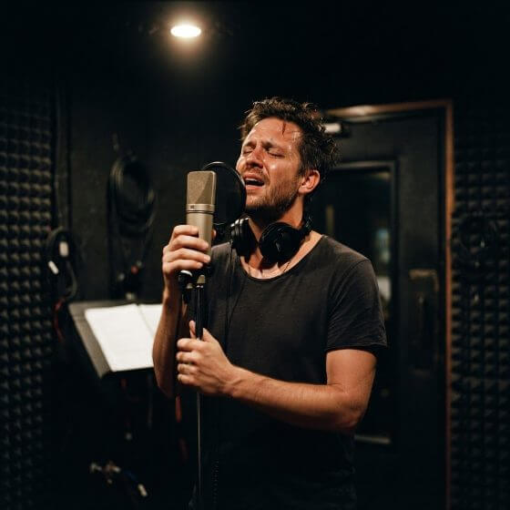 Example image: A singer on screen