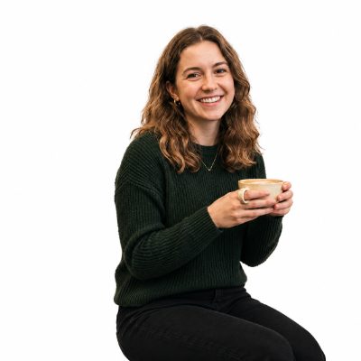 Same woman cut out on a plain white background after AI background removal