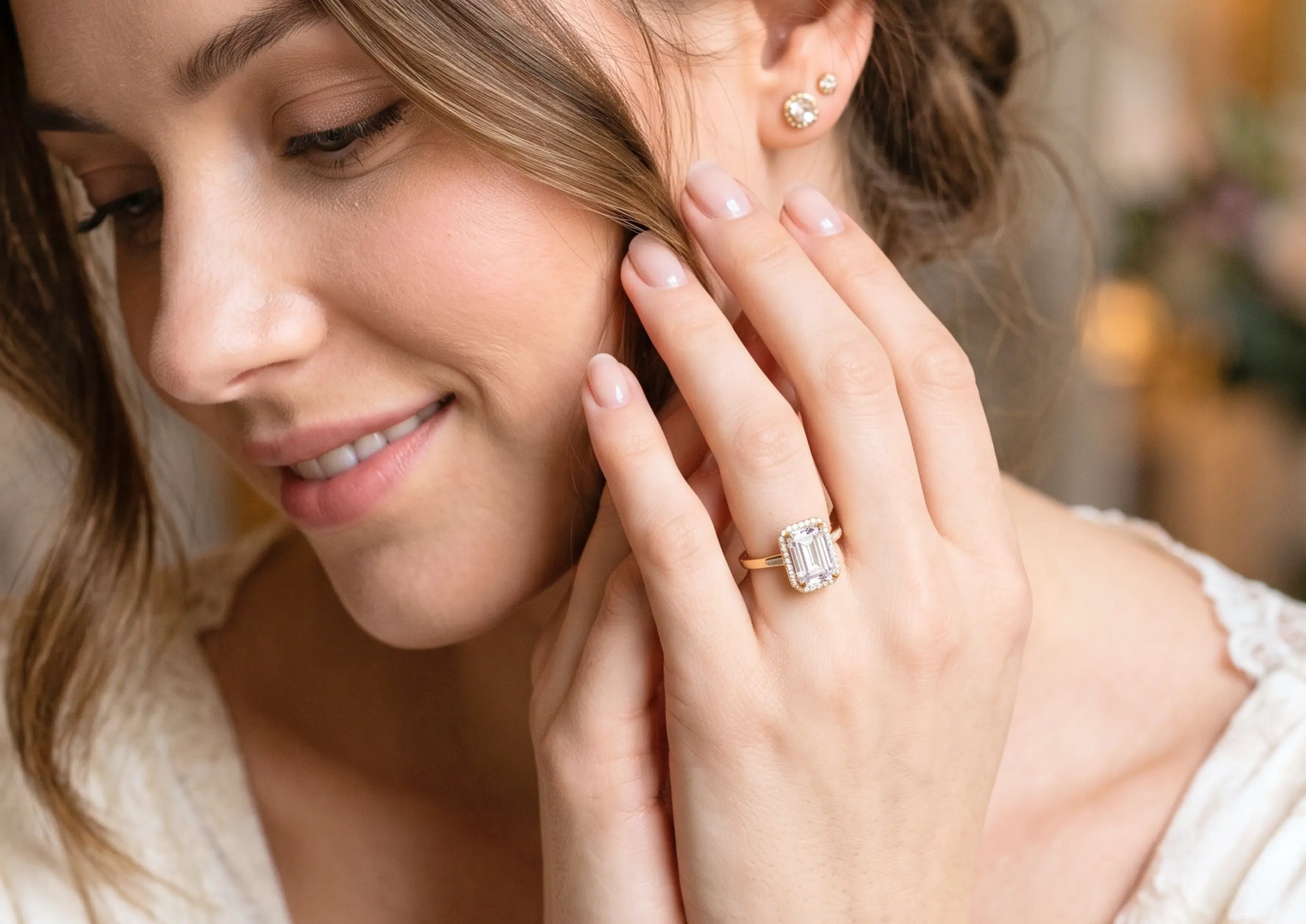 Woman viewing a virtual try-on of a 1.5 carat diamond ring on her hand through a jewelry retailer app