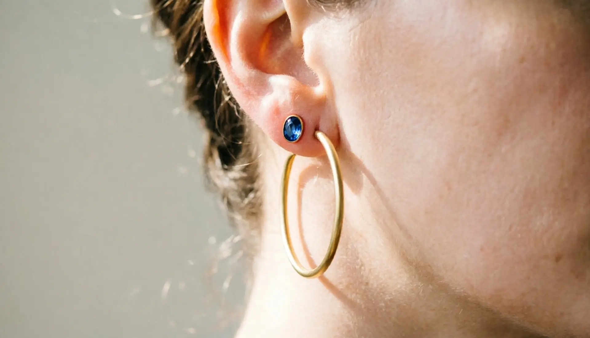 AI ear piercing diagram API turning a flat piercing chart into a photorealistic try-on render