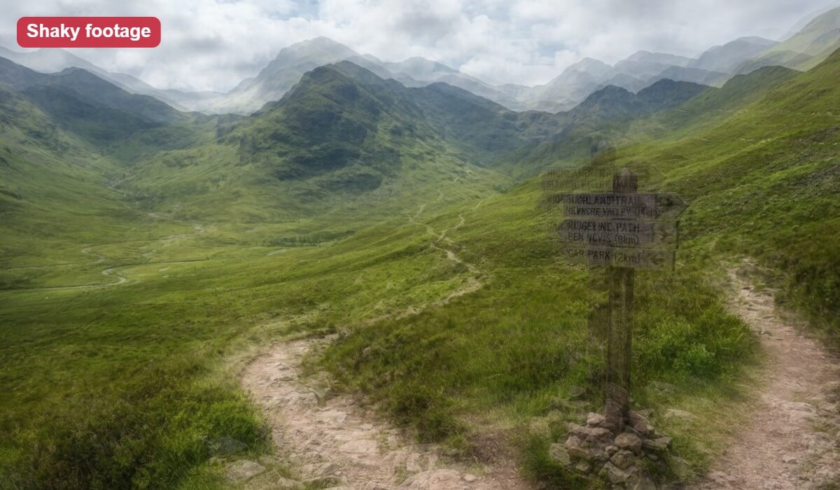 A walking clip of a mountain trail, shown as an illustrative shaky frame with blurred double edges